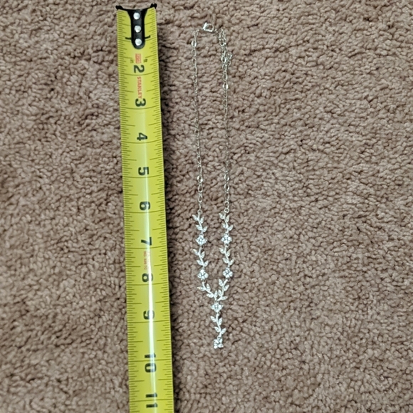 Silver floral necklace with matching earrings. - Picture 3 of 3